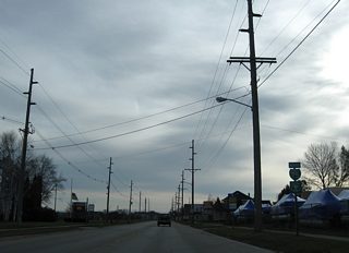 Business Spur I-75 shield posted along East Portage Avenue after Barbeau Street.