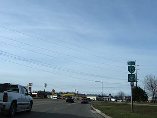 Business Spur I-75 follows Three Mile Road west from Mackinac Trail to its end.