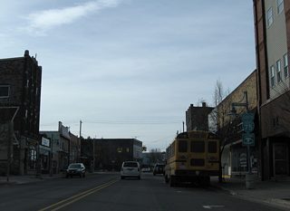 Southbound Ashmun Street on the block between Portage Avenue and Maple Street.