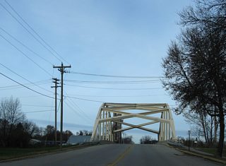The East Portage Avenue Bridge is one of seven bridges crossing the Edison Power Canal. The canal flows south around the Sault Ste. Marie business district from Ashmun Bay east to the Edison Powerhouse at the Saint Marys River.