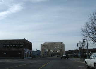 Peck Street east and Library Drive west come together at Business Spur I-75 ahead of its second crossing of the Edison Power Canal.