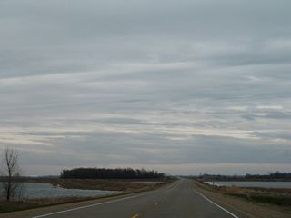 MN 28 crosses a causeway between a series of ponds east of Barry.