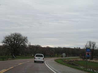 MN 28 curves southeast from CR 2.