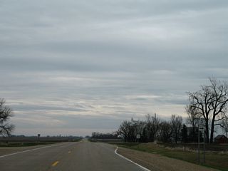 CR 3 (830th Avenue) straddles a section line north and south of MN 28.