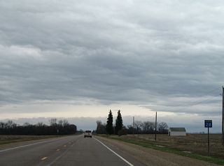 This confirming marker stands after the separate of MN 28 east with CR 13 south.