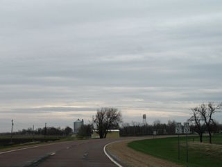 MN 28 shifts south onto Keystone Avenue ahead of CR 33 and 51 at Beardsley.