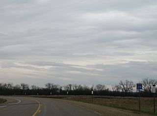 MN 28 curves northeast from CR 35 to circumvent West Toqua Lake.