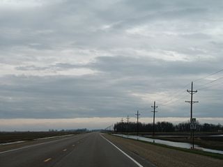 CR 65 meets MN 28 east at the upcoming intersection with 710th Avenue.