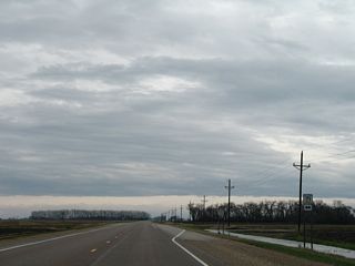 CR 71 travels south from parallel CR 73 to intersect MN 28.