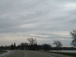 MN 28 straddles the north side of East Toqua Lake into Graceville.
