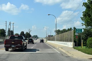 U.S. 63 / Highway 30 spans the north branch of the Root River ahead of 10th Street NW in Stewartville.