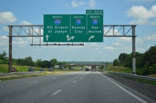 A directional T interchange connects Interstate 435 north with I-35 leading southwest to Ravenwood-Somerset and Glenhaven in Kansas City and I-35 north to Cameron and Des Moines, Iowa.