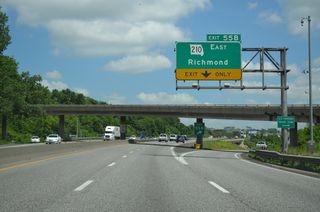 Construction from Fall 2016 to September 2019 rebuilt the diamond interchange at Exit 55B into a DDI.2 Route 210 runs east to Riverbend, Missouri City, Orrick and Route 10 outside of the Ray County seat of Richmond.
