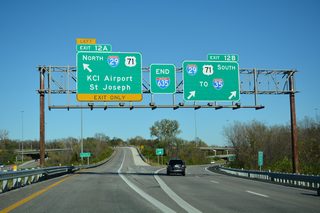 Two lanes depart at Exit 12 B for I-29/U.S. 71 south to Gladstone and I-35 at Crestview in Kansas City.