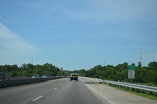 Interstate 635 crosses the Missouri River along a steel girder bridge built in 1976.