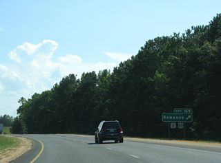 U.S. 11/80 converge with I-59/20 west between the town of Cuba, Alabama and the unincorporated community of Toomsuba.
