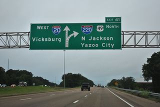 A lane drop occurs at Exit 41 for I-220/U.S. 49 toward north Jackson.
