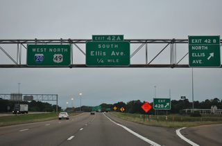 A cloverleaf interchange joins I-20/U.S. 49 with Ellis Avenue at Exit 42.