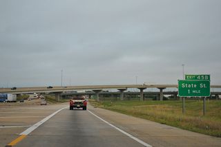 Northbound U.S. 49 combines with I-20 west and I-55 south one mile ahead of Exit 45B for State Street (U.S. 51).
