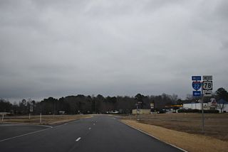 Veterans Memorial Boulevard heads 1.88 miles north from MS 6 past Veterans Park to the diamond interchange (Exit 87) with I-22/U.S. 78 in northeast Tupelo.