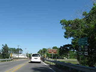 MS 29 north splits with MS 26 (Central Avenue) east at a grade separated intersection with Magnolia Drive (old U.S. 49) south of Downtown Wiggins.