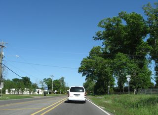 MS 26 east confirming marker posted after the separation with MS 29 and the at-grade crossing with the Kansas City Southern Railroad line along Central Avenue.