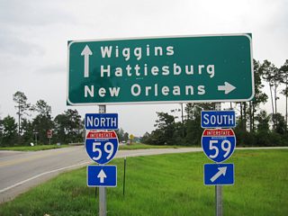 Advancing 2.1 miles east from MS 53 (Main Street), MS 26 meets Interstate 59 at a diamond interchange outside Poplarville. I-59 travels southwest to Picayune, Pearl River and Slidell, Louisiana.