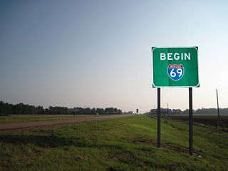 Removed by 2013, a begin sign for Interstate 69 north was formerly located north of Old Highway 304 along MS 713 eastbound.