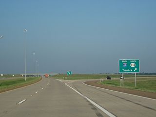 I-69 angles southwest from MS 304 alongside MS 713, 2.10 miles to the Tunica County line.