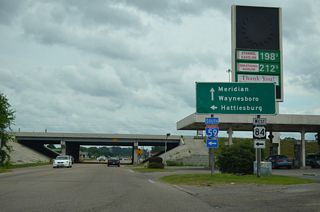 U.S. 84 west joins Interstate 59 south for 2.5 miles to bypass Downtown Laurel. U.S. 84 east overtakes Chantilly Street to the city line at Tallahala Creek en route to Waynesboro.