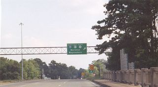 A loop ramp takes U.S. 84/MS 15 east onto I-59 north. S 16th Avenue extends another 0.85 miles south to U.S. 11 (Ellisville Boulevard).