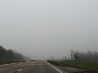 U.S. 84 continues east between Clarks Lake and Kees Creek.