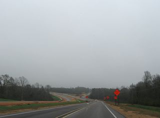 U.S. 84 circumvents the Jefferson Davis County seat of Prentiss to the north along a controlled access expressway. The former alignment, including an at-grade bypass of the town, is MS 184.