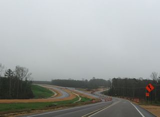 The Prentiss bypass along U.S. 84 opened to traffic by May 2009. The expressway includes a diamond interchange with MS 13 north of the original separation with U.S. 84 at Columbia Avenue.