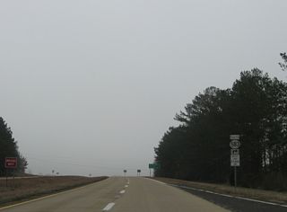 MS 583 partitions with U.S. 84 east at the intersection with County Farm Lane.
