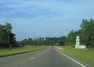 U.S. 84 east next meets MS 588 (Ellisville Road) south and Salem School Road north.