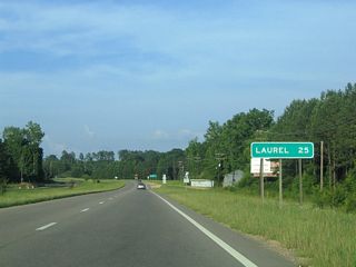 MS 184 returns to U.S. 84 from Collins at Salem Church Road ahead of Rogere Creek and this distance sign to Laurel.