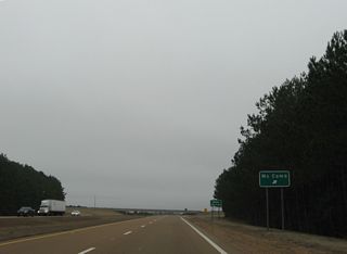 Regionally U.S. 98 heads southeast from Bude to an overlap with I-55 between Summit and McComb.