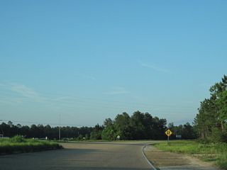 U.S. 90 curves eastward alongside Interstate 10 just ahead of the Alabama line.