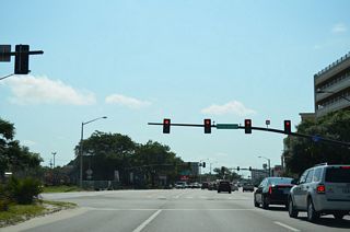 The signalized entrance to the Beau Rivage Casino parking garage is adjacent to the I-110 flyovers.