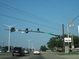 Blue Meadow Road south and Main Street west come together at U.S. 90 by Zuppardo's Bay Plaza shopping center.