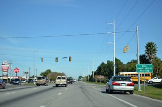 Chicot Road north 0.33 miles and Shortcut Road 0.46 miles west to MS 613 are the unsigned northern branch of MS 611.