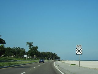 Reassurance marker posted east of Davis Avenue and south of War Memorial Park in Pass Christian.