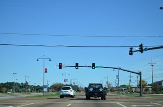 Span wire traffic signals at Dolphin Drive were replaced with mast-arm assemblies in 2010.