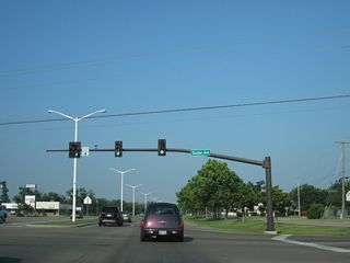 Dunbar Avenue leads south into residential areas of Bay St. Louis and north to N Beach Boulevard (MS 606) by Cowand Point along St. Louis Bay.