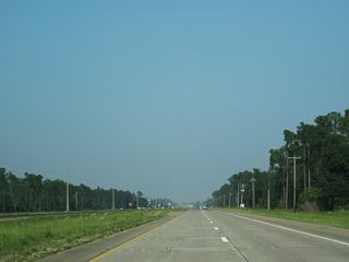 U.S. 90 east ahead of Hancock Drive. The concrete roadways along U.S. 90 were paved over with asphalt by 2023.