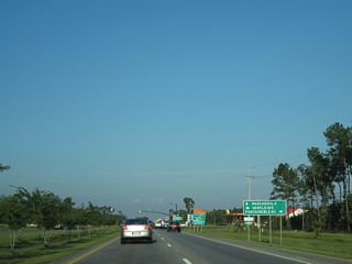 U.S. 90 intersects MS 57 north and Old 57 Road south at the eastern limits of Ocean Springs.