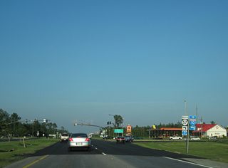 MS 57 constitutes a four lane highway north 2.69 miles to Interstate 10 at Exit 57 and 7.6 miles to the expressway bypass of Vancleave.
