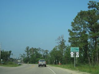0.34 miles east into Mississippi, U.S. 90 intersects the west end of MS 604. MS 604 comprises a 5.11 mile long highway north through Pearlington to MS 607 near Interstate 10.
