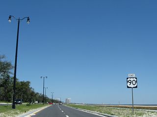 The confirming marker for U.S. 90 east of MS 605 (Cowan Road) was removed by 2010.